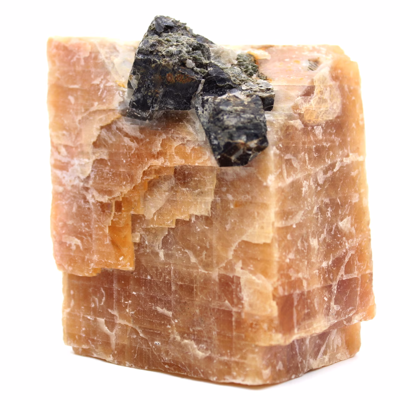 Cristaux de mica noir sur sur bloc de calcite orange