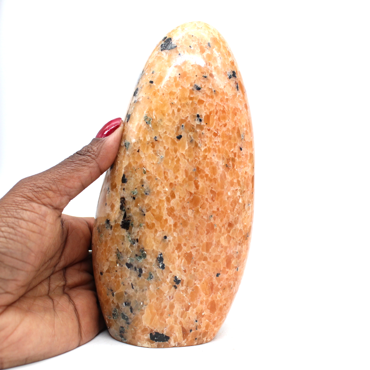 Forme libre polie en calcite orange