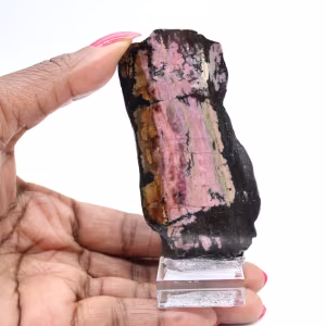 Pierre de Rhodonite naturelle minéral brut et unique